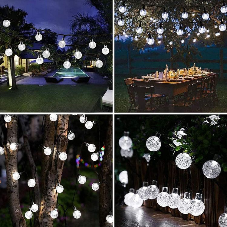 Picture of Solar Garden Lights Outdoor, 50 LED 7M/23Ft Solar String Lights Waterproof 8 Modes Indoor/Outdoor Fairy Lights for Garden Patio Yard Home Party Wedding Festival Decoration (Clear White) [Energy Class A+++]